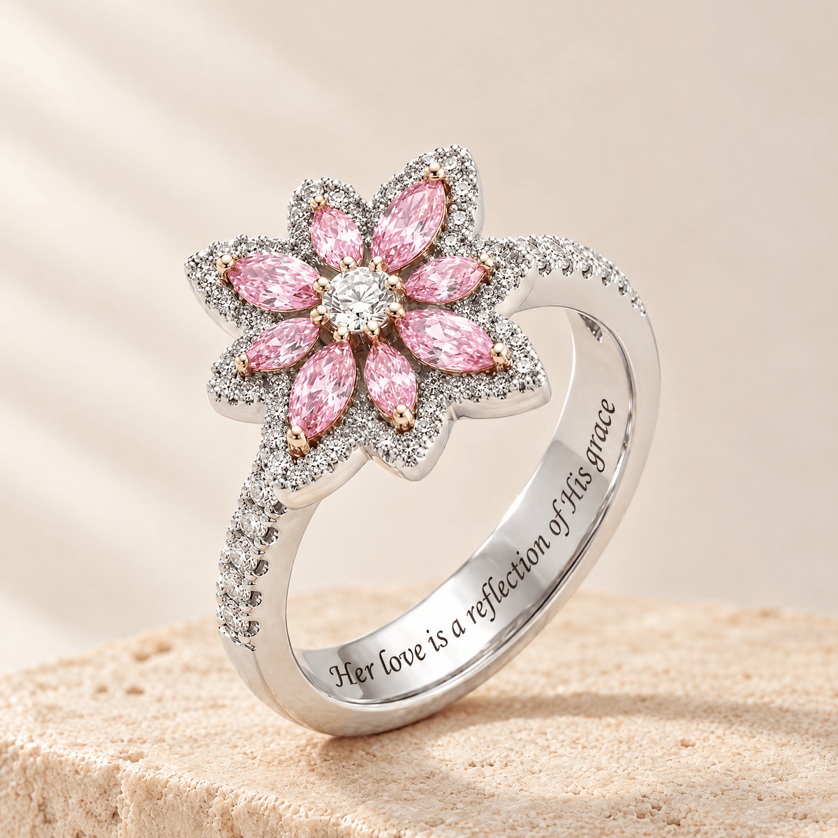 Pink Zircon Flower Ring - Deborah on a travertine stone