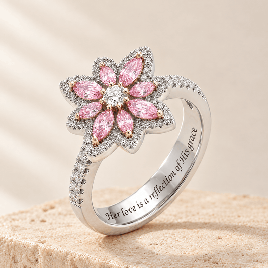 Pink Zircon Flower Ring - Deborah on a travertine stone