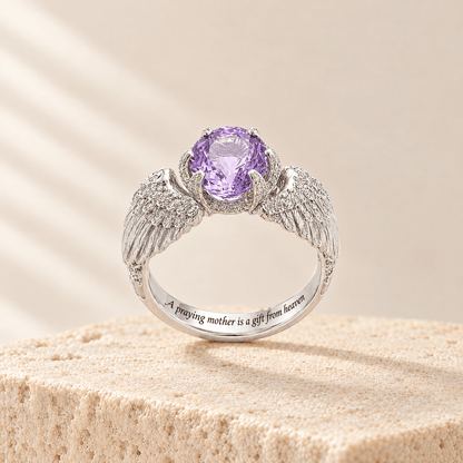 Oval Violet Zircon Ring - Anna on a travertine stone