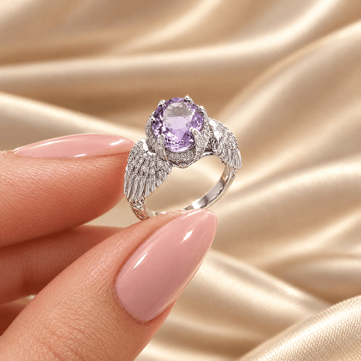 Oval Violet Zircon Ring - Anna held between fingers