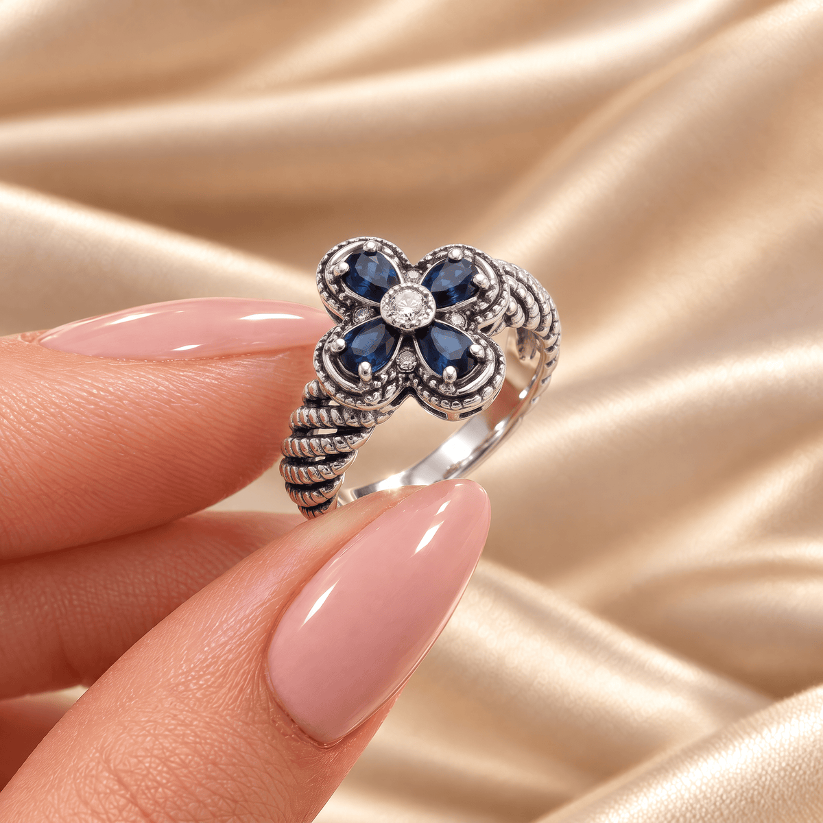 Blue Zircon Flower Rope Ring - Rachel held