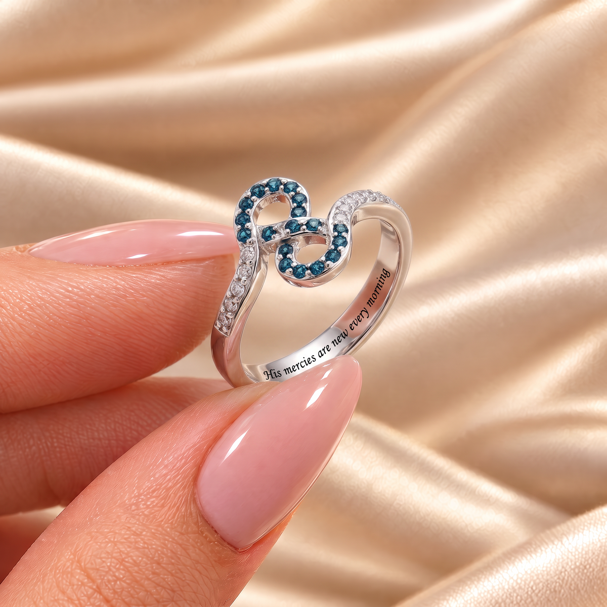 Blue Zircon Infinity Ring - Leah held