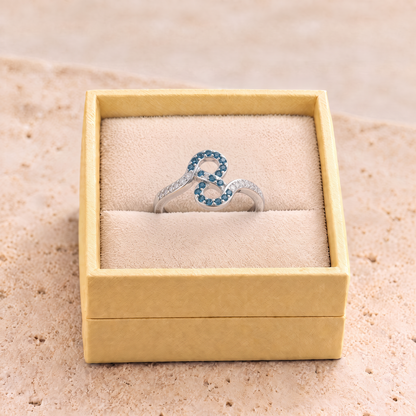 Blue Zircon Infinity Ring - Leah in gift box