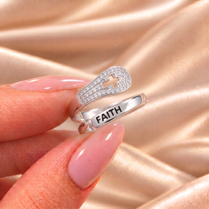 Mary Faith ring held on satin