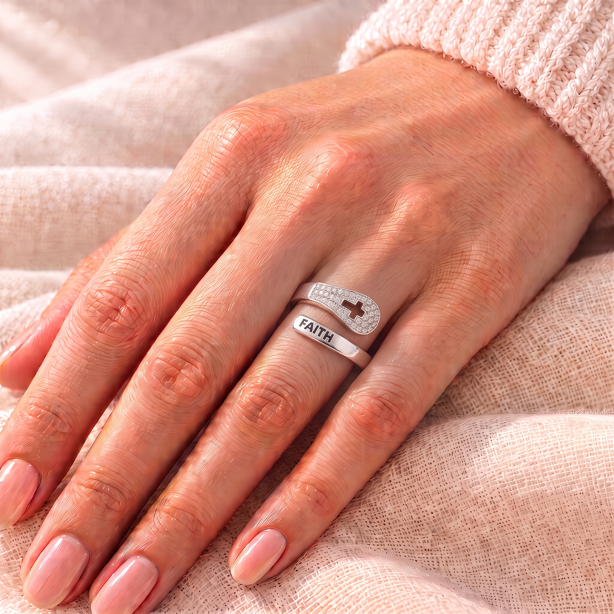 Mary Faith ring worn on hand