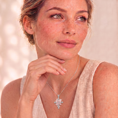 Woman wearing the Lydia flower cross necklace