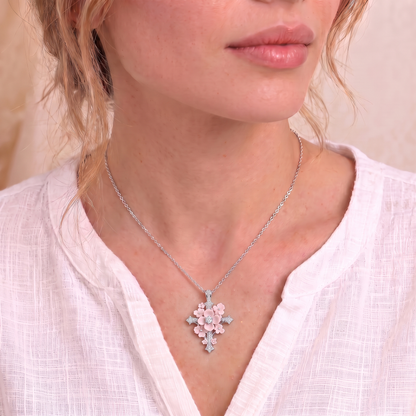Lydia flower cross necklace on the neck