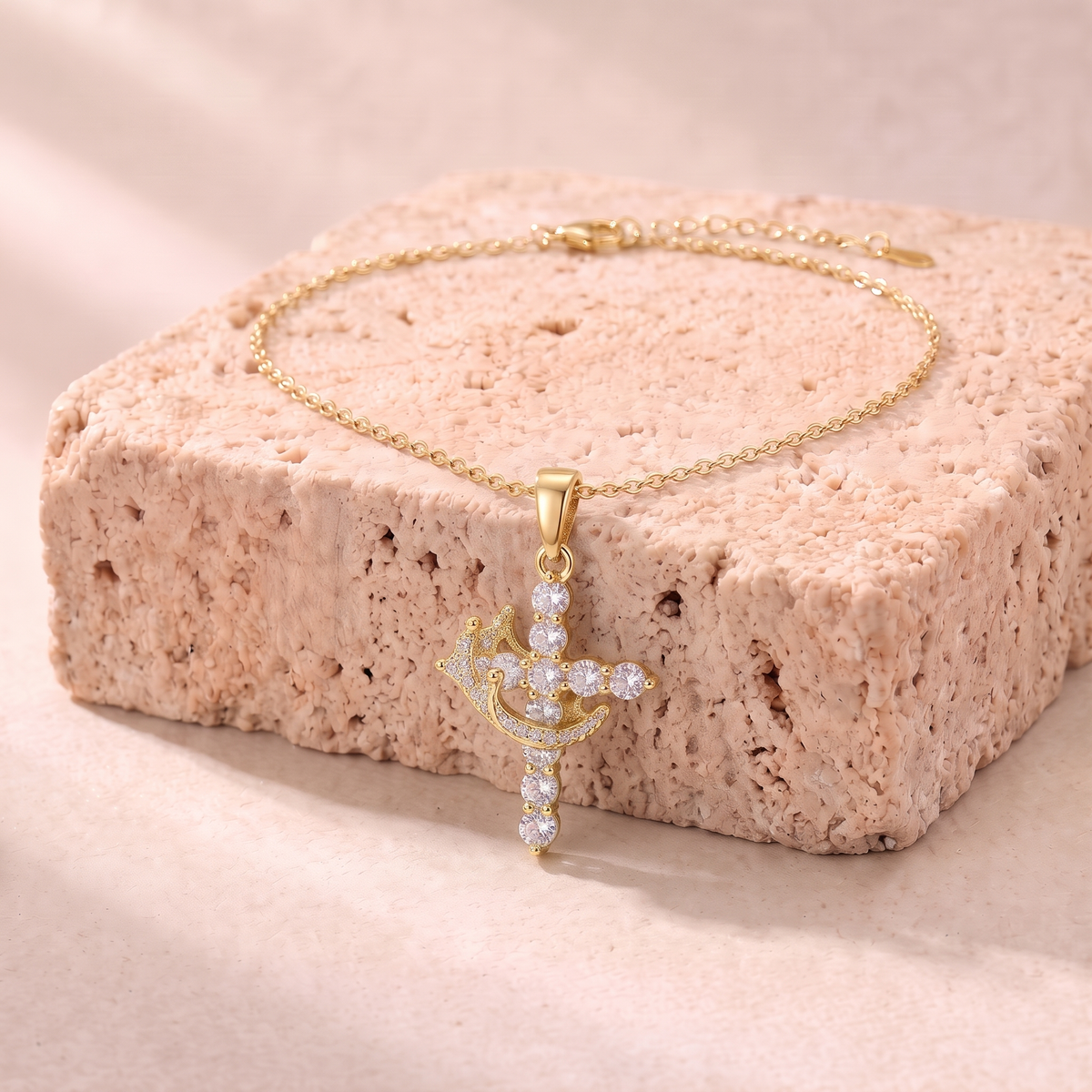 Claudia zircon cross and crown necklace in gold