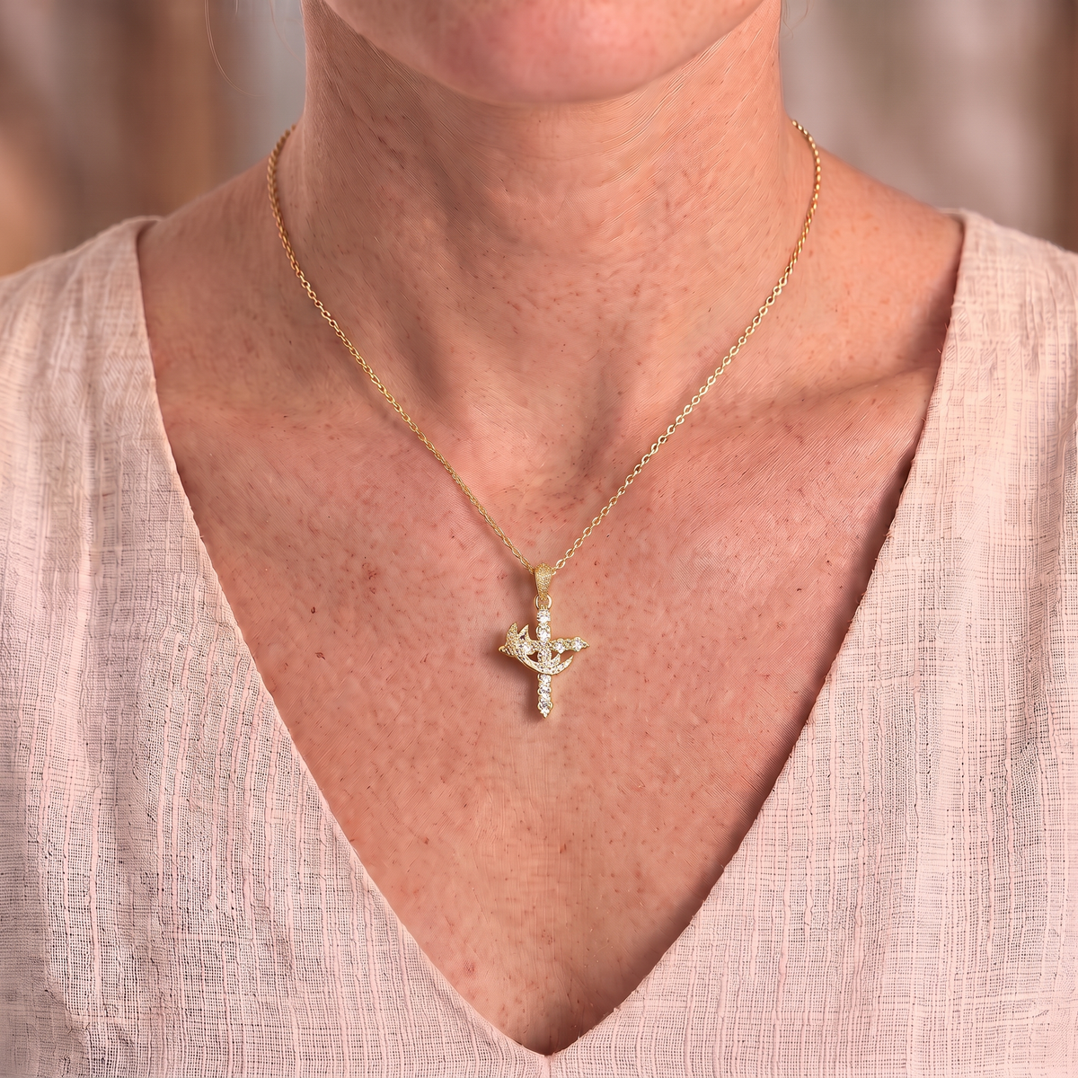 Claudia gold necklace worn close-up